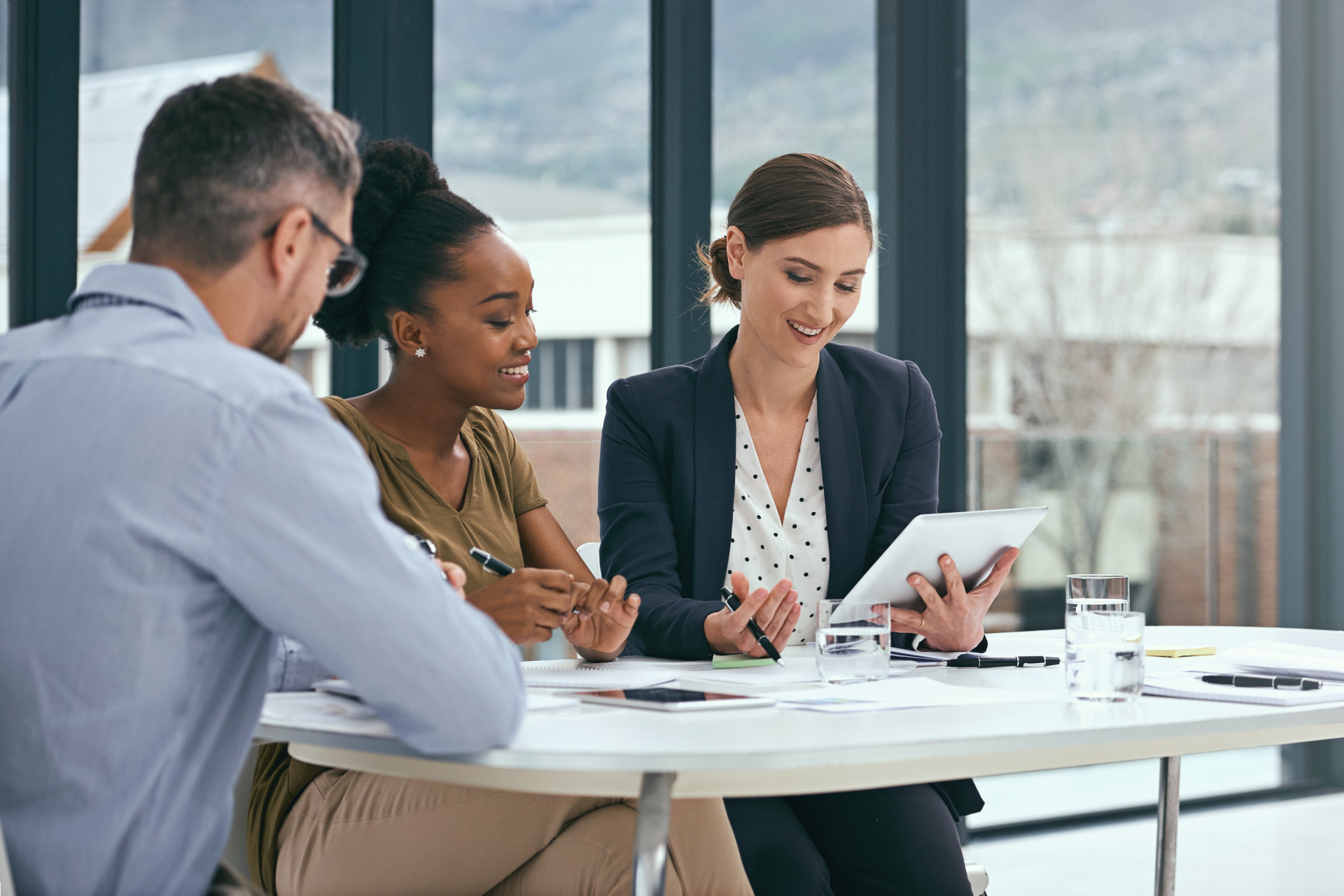 Solicitors discussing their financial records with an expert accountant.
